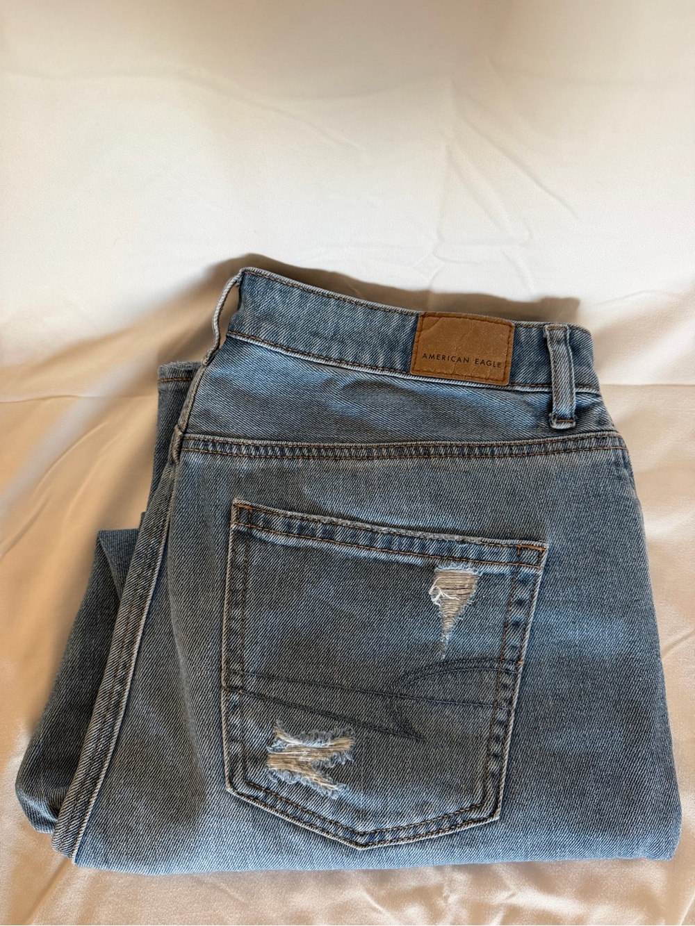 American Eagle Outfitters faded blue — high-rise mom jeans